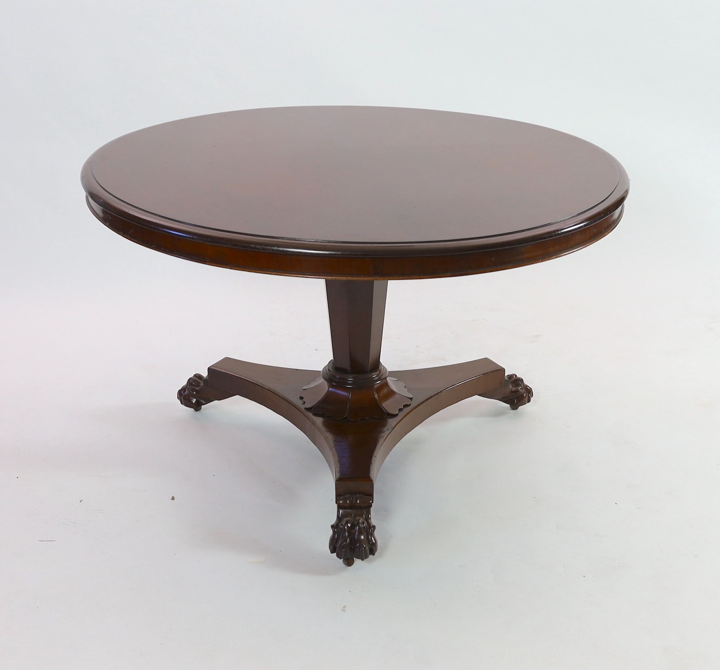 A William IV circular mahogany tilt top breakfast table, on octagonal tapered pillar, diameter 116cm height 73cm